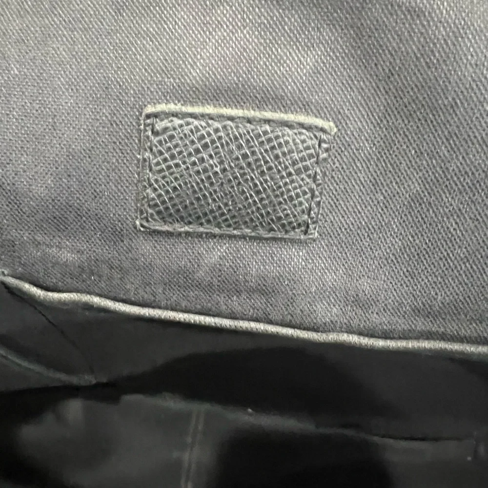 LOUIS VUITTON Grizzli Taiga Leather Andrei Messenger Bag